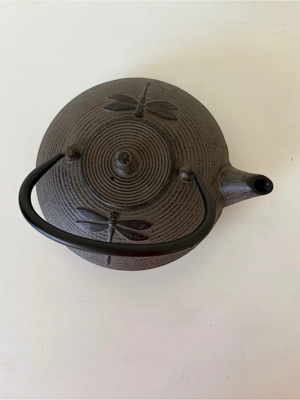 Black Cast Iron Dragonfly Motif Teapot with Curved Handle